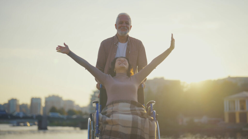 happy woman in wheelchair with her arms outstretched to the sides senior woman in whee sbi 351077560 happy woman in wheelchair with her arms outstretched to the sides senior woman in whee sbi 351077560